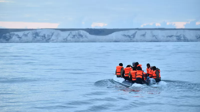 How many people cross the Channel in small boats and how many claim asylum?